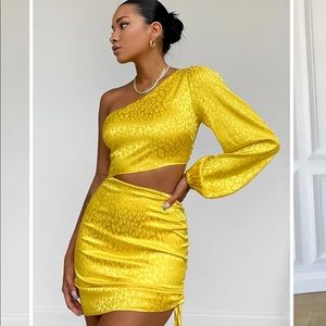 A beautiful one shoulder yellow dress from Runaway the Label.